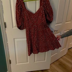 Burnt orange color puff sleeve mini dress. V neck.